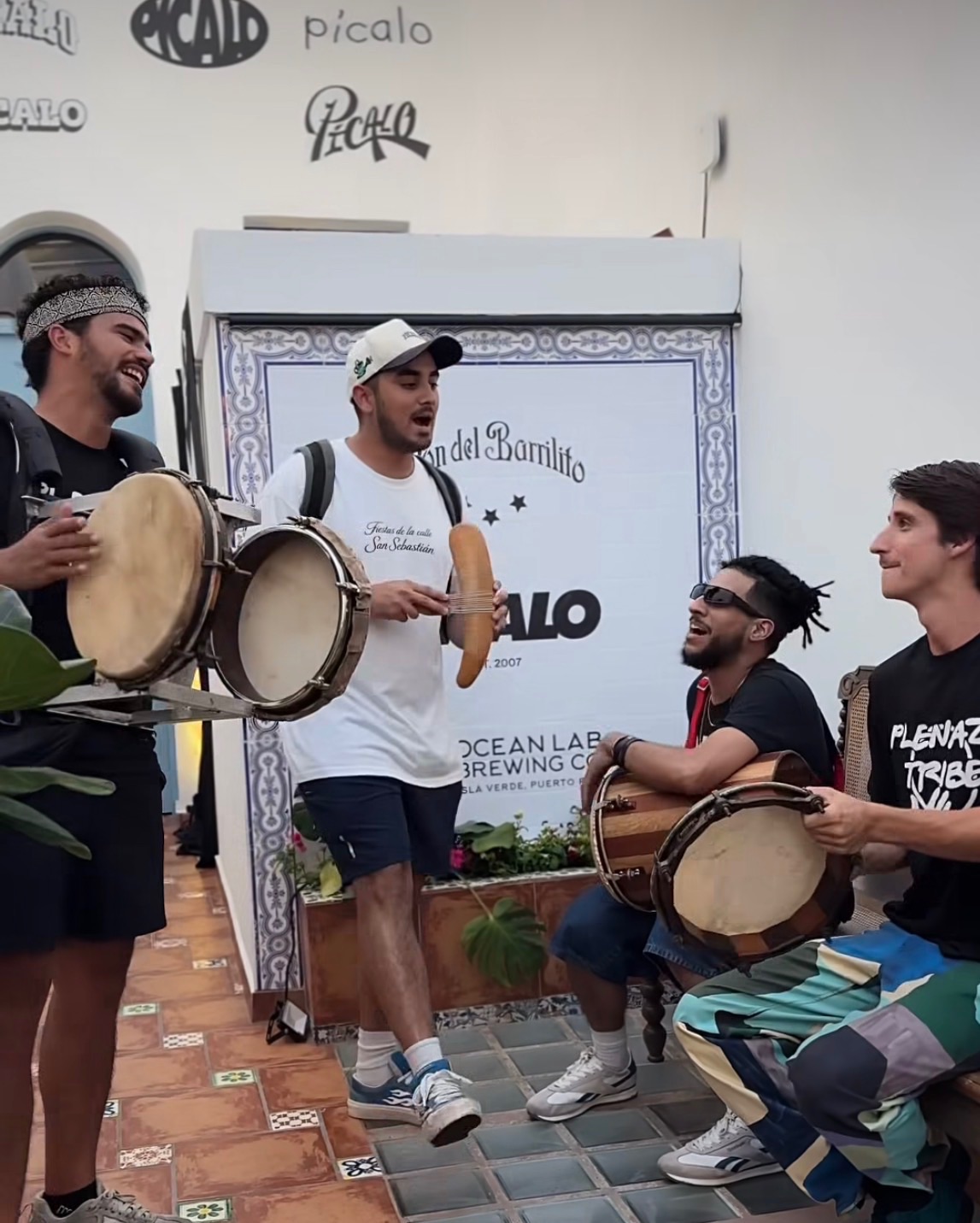 Benjamin Henry Schultz performing Plena alongside Triplena and Plenazo Tribe